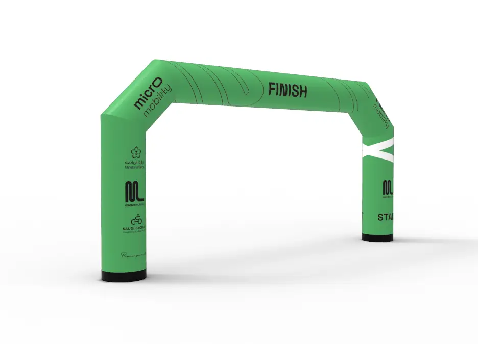 Green inflatable finish line arch for Saudi Cycling event featuring Ministry of Sport branding.
